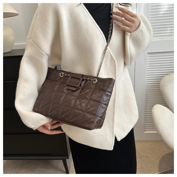 Women shoulder bag in trapezoid shape with chain strap, PU material, three-dimensional pocket, available in black white khaki brown