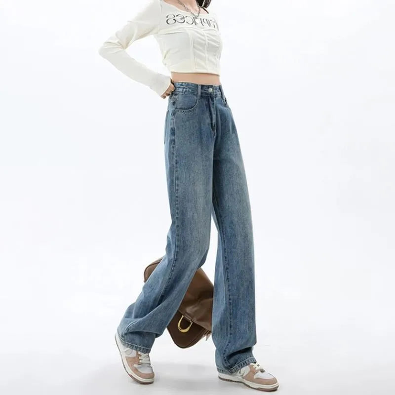 Women's retro blue wide leg jeans with high waist and straight leg silhouette on hanger