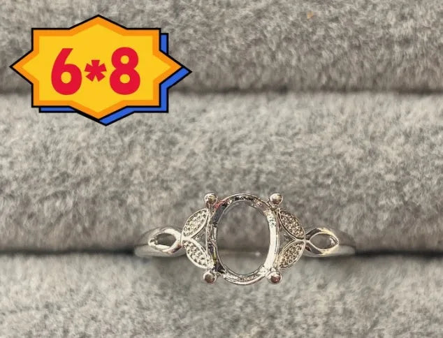 Copper oval denier ring with a 6x8 mm stone and a five-pointed star design.