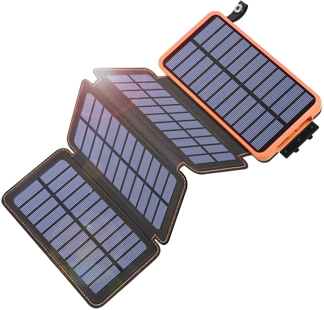 Black outdoor solar phone charger with leather exterior, solar panel, and LED light.