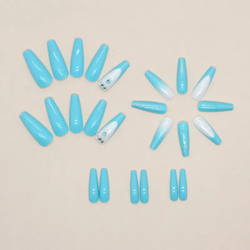 Smart blue diamond coloured press-on artificial nails in a ballet length style.