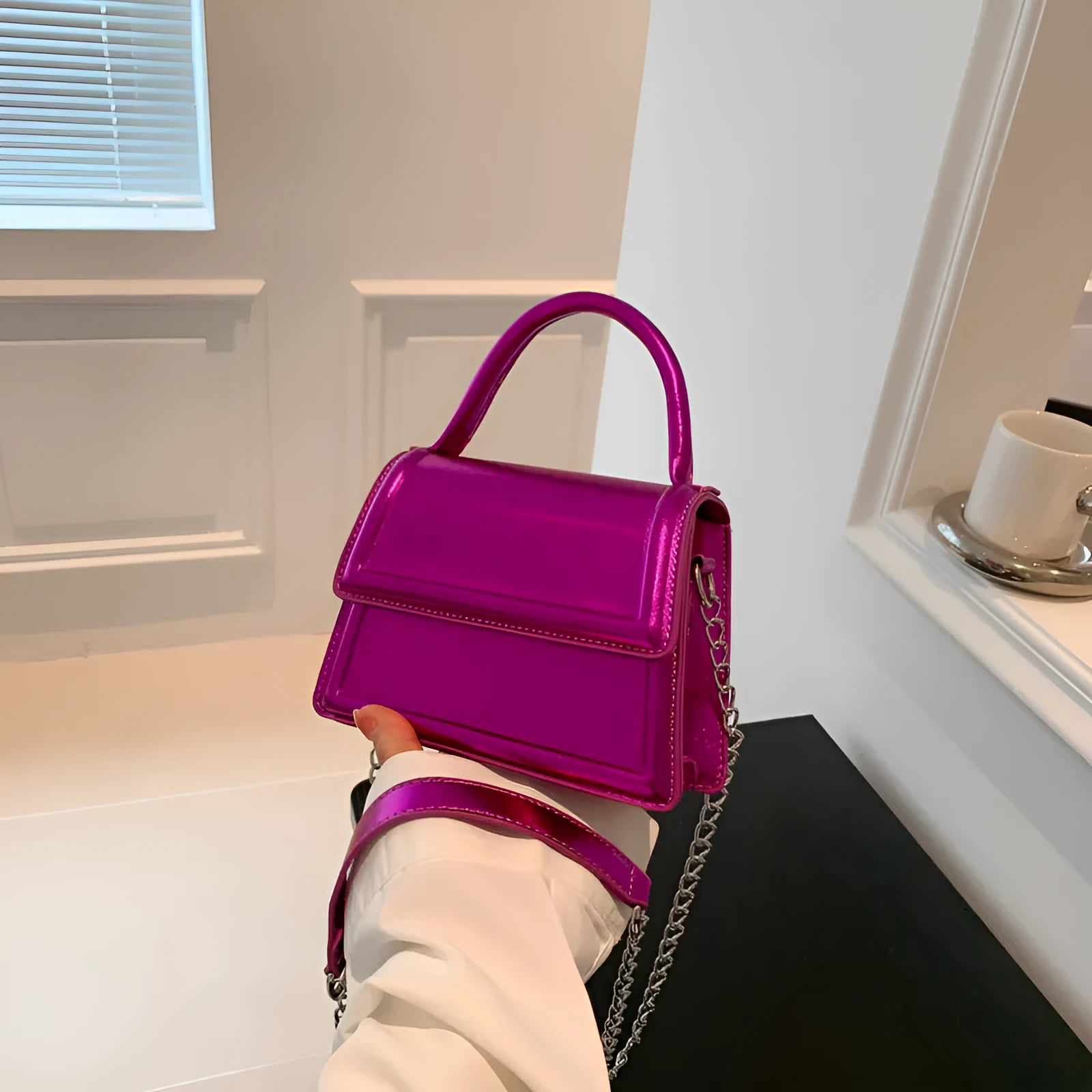 Retro square-shaped PU crossbody bag in a choice of six colours on a model.