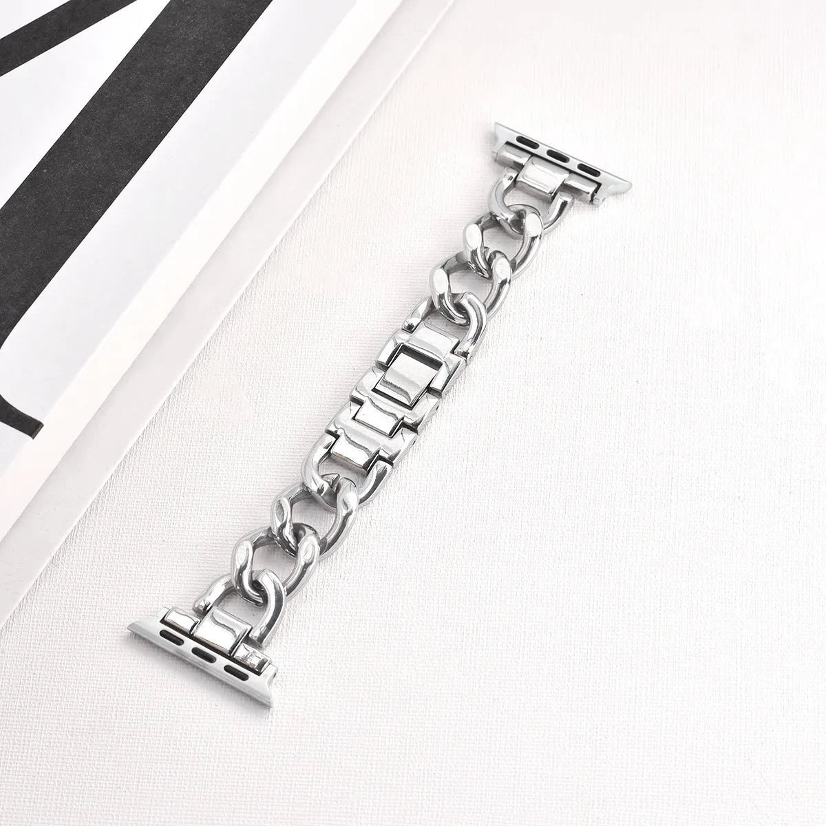 Silver denim chain link metal strap for Apple Watch with 22mm lug width on a 41mm case.