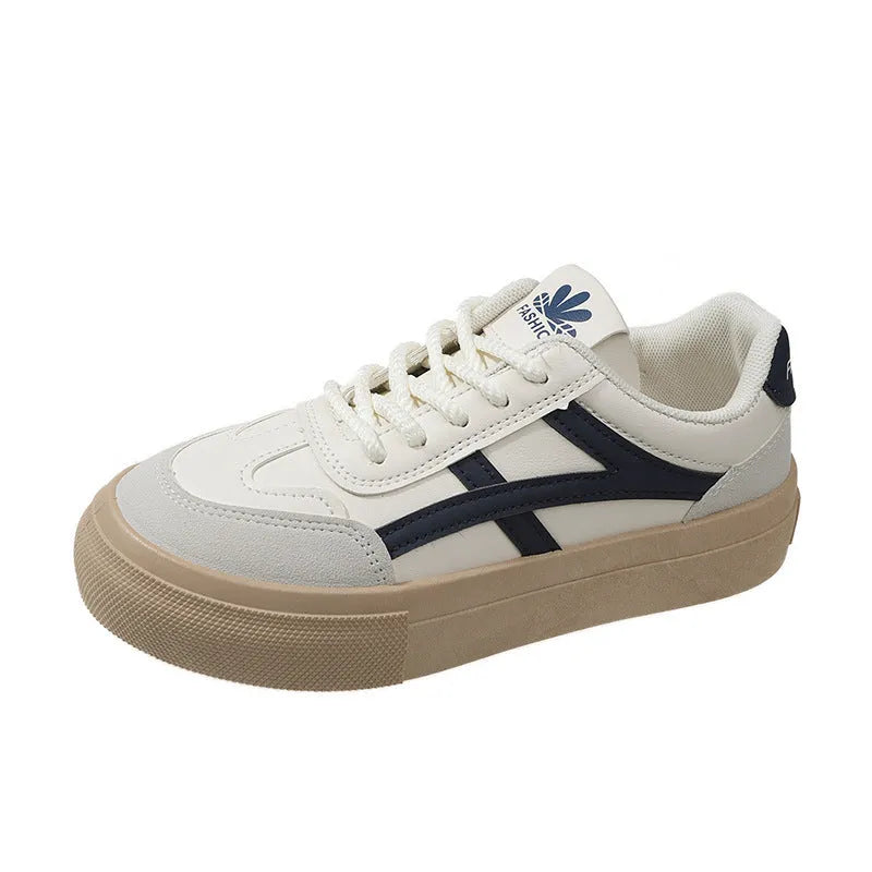 Brown and blue low-top lace-up casual shoes with a patent leather finish and round toe.