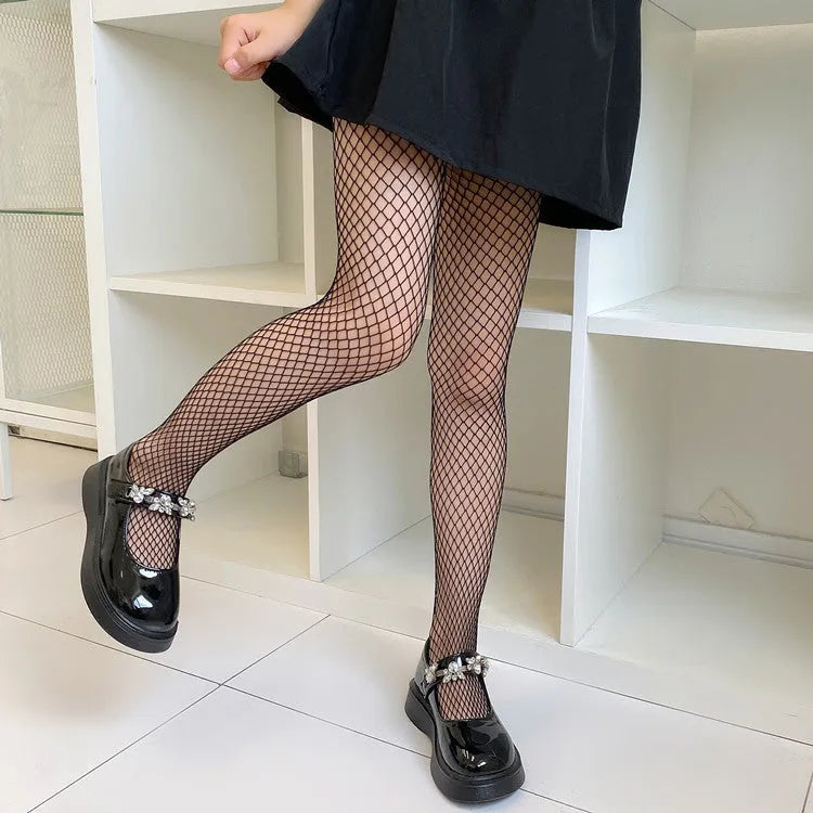 Women's summer mesh stockings showing large, medium and small net patterns in black and white.