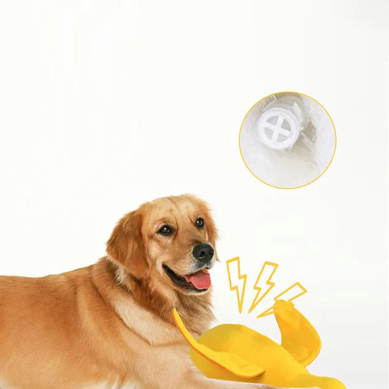 Yellow teddy-shaped rubber dog toy with squeaker duck sound and food leak holes