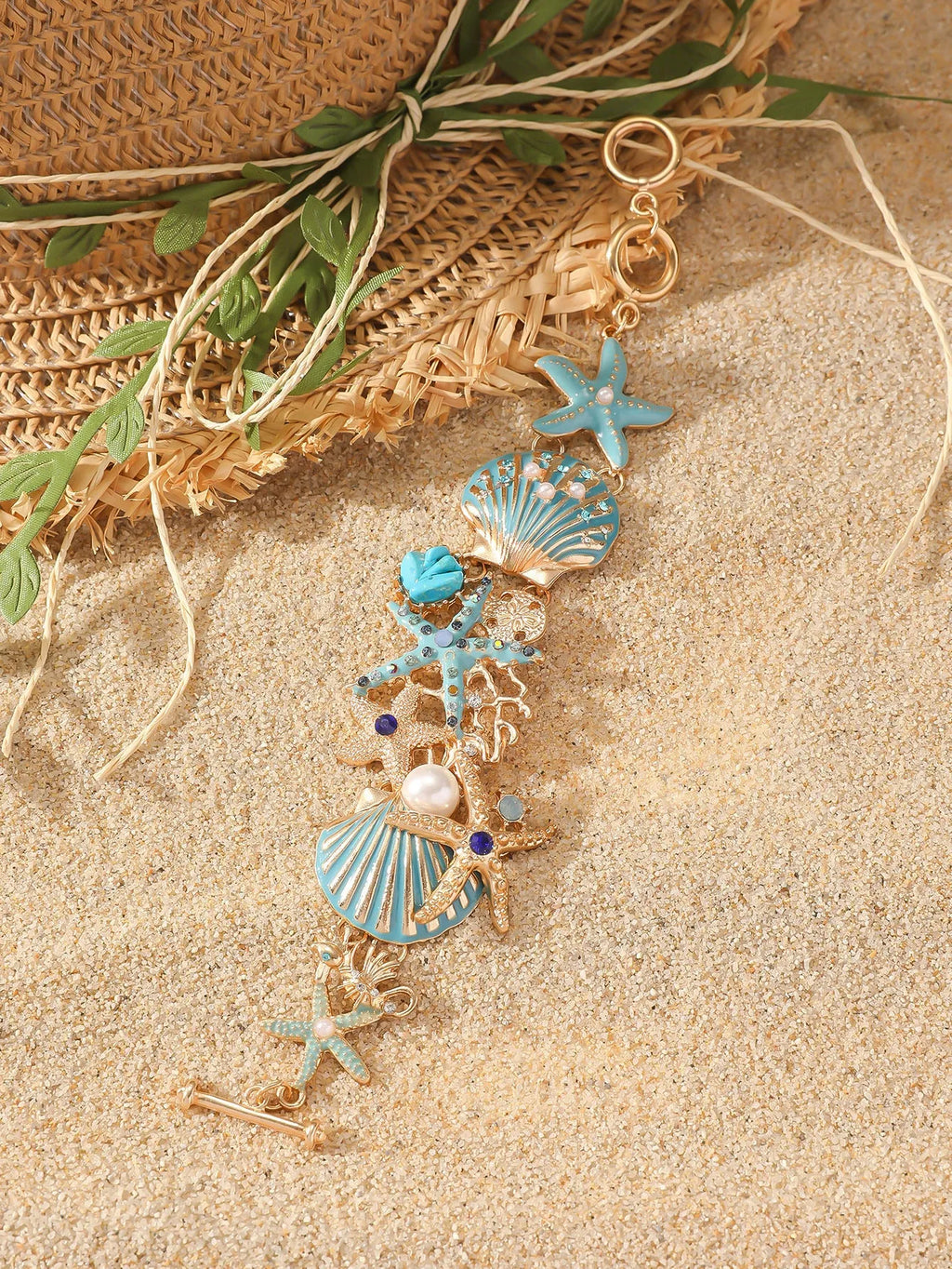 Women's alloy bracelet with boat anchor and starfish design in turquoise, red, or blue.