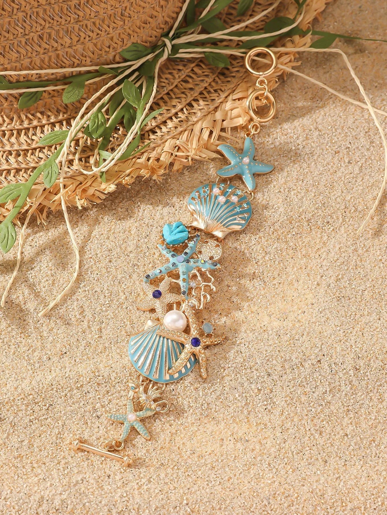 Women's alloy bracelet with boat anchor and starfish design in turquoise, red, or blue.