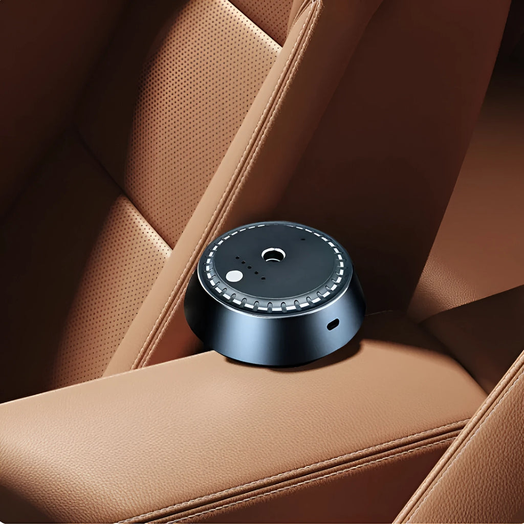 Black metal smart car aroma diffuser with USB port, measuring 9x4.5cm.