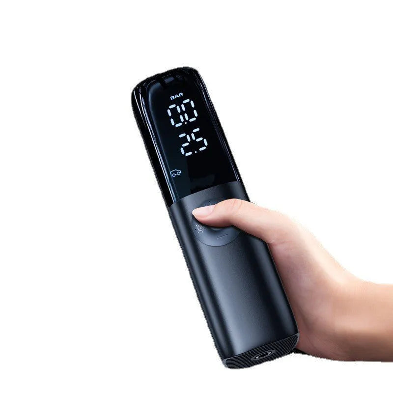 Black portable electric car air pump with tyre pressure gauge and inflation hose
