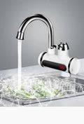 White electric instant water heater with digital temperature display for kitchen installation