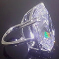 Simple white gold colour alloy ring with geometric band and inlaid square diamond design