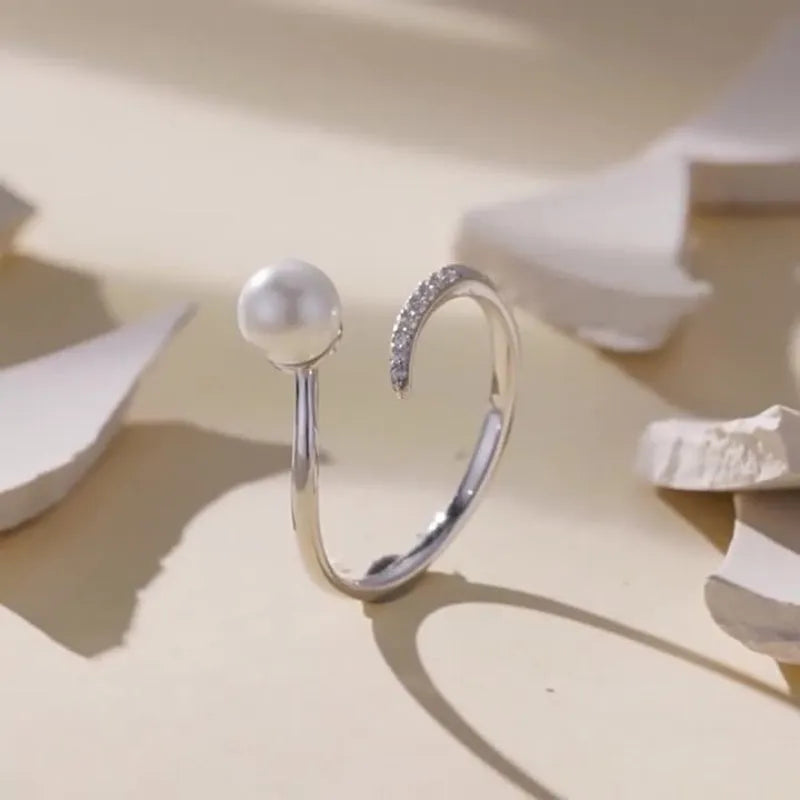 Adjustable S925 sterling silver ring with shell pearls design and open loop for flexible fit