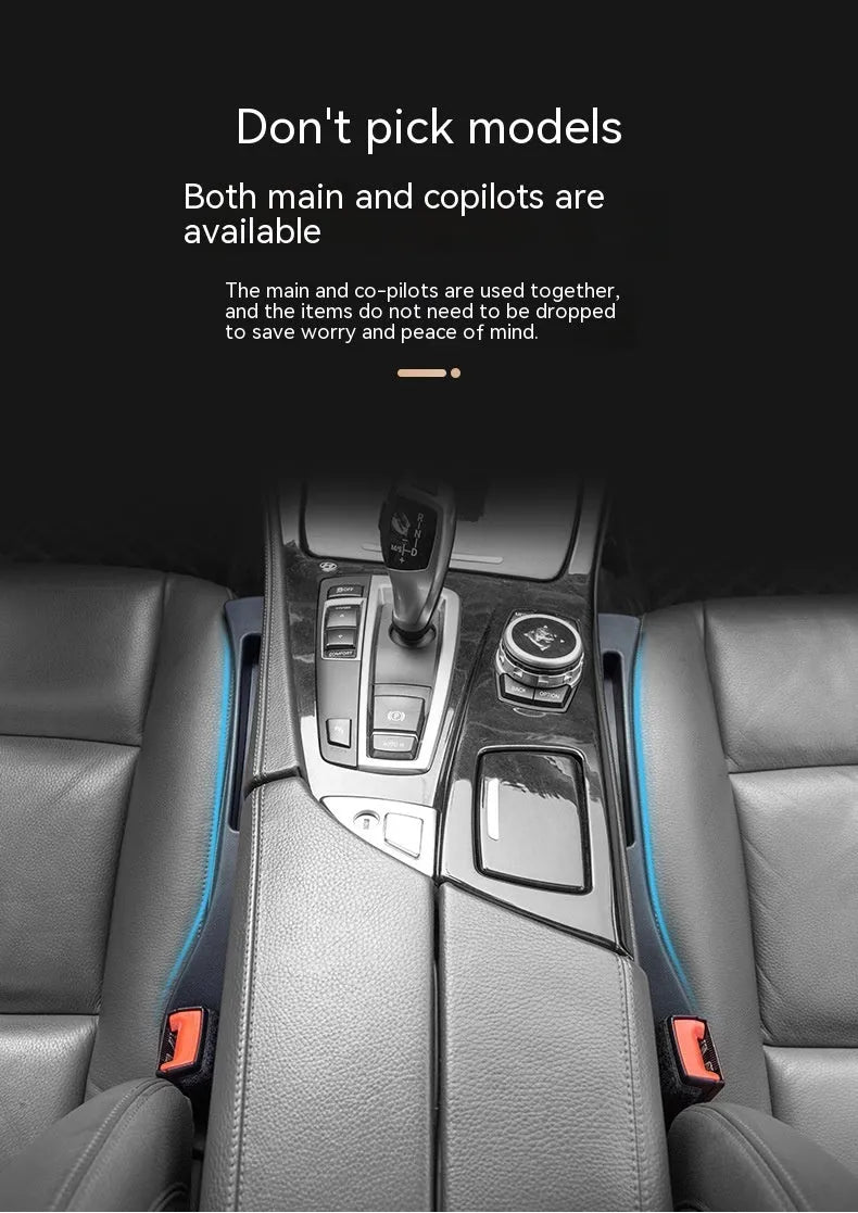 Black car gap storage box with handle placed between vehicle front seats