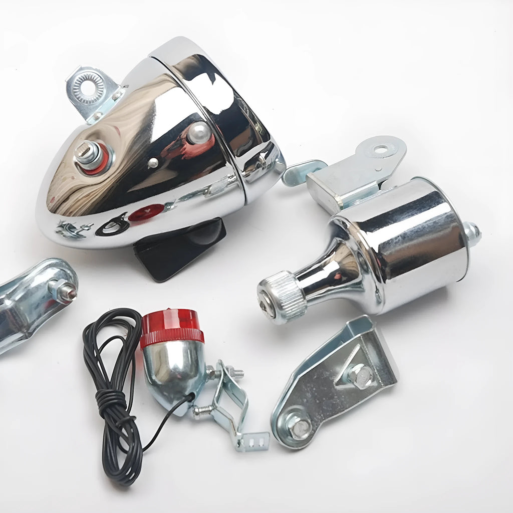Silver bicycle dynamo generator light modification kit showing mounting bracket and wiring connections