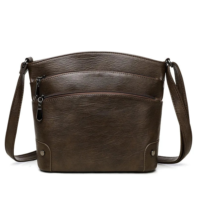 Large capacity multi-layer bucket bag in available colours including black, brown, and green