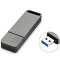 Black metal USB flash drive with custom graphic design showing capacity options