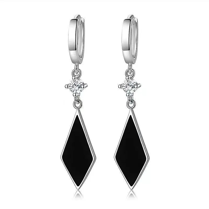 Silver vintage diamond geometric earrings with Japanese Korean style influences and ear clip design