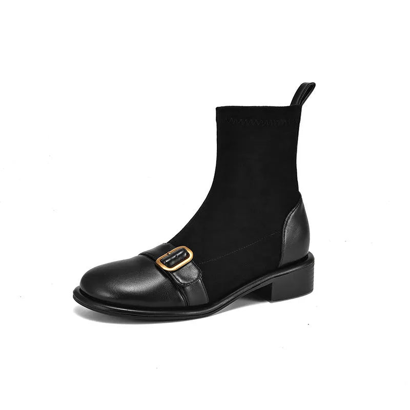 Women's black low heel lace-up Martin boots with round toe and rubber sole.