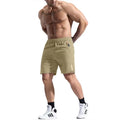 Men's grey elastic waist bamboo fibre sports shorts laid flat, showing drawstring and shorts length.