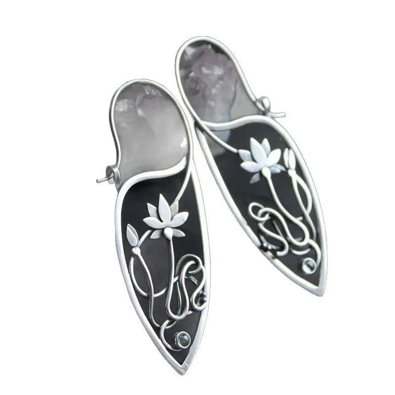 Silver rhinestone earrings with geometric lotus vine design on alloy base