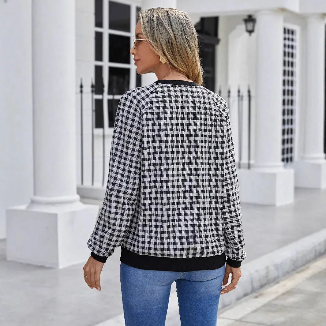 Black long sleeve pullover sweater with a printed Japanese plaid pattern