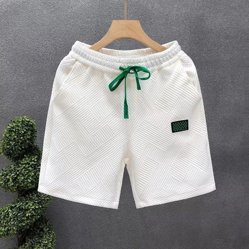 Men's solid colour polyester sports shorts in black, shown in an American casual style fit.