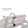 Steel cable lock with plastic sheath for securing equipment on a vehicle roof platform.