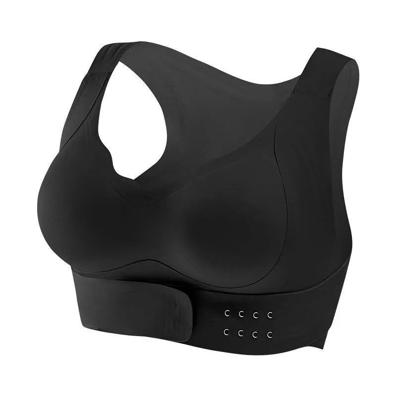 Women's black sports bra with front buckle closure and contoured back design for yoga.