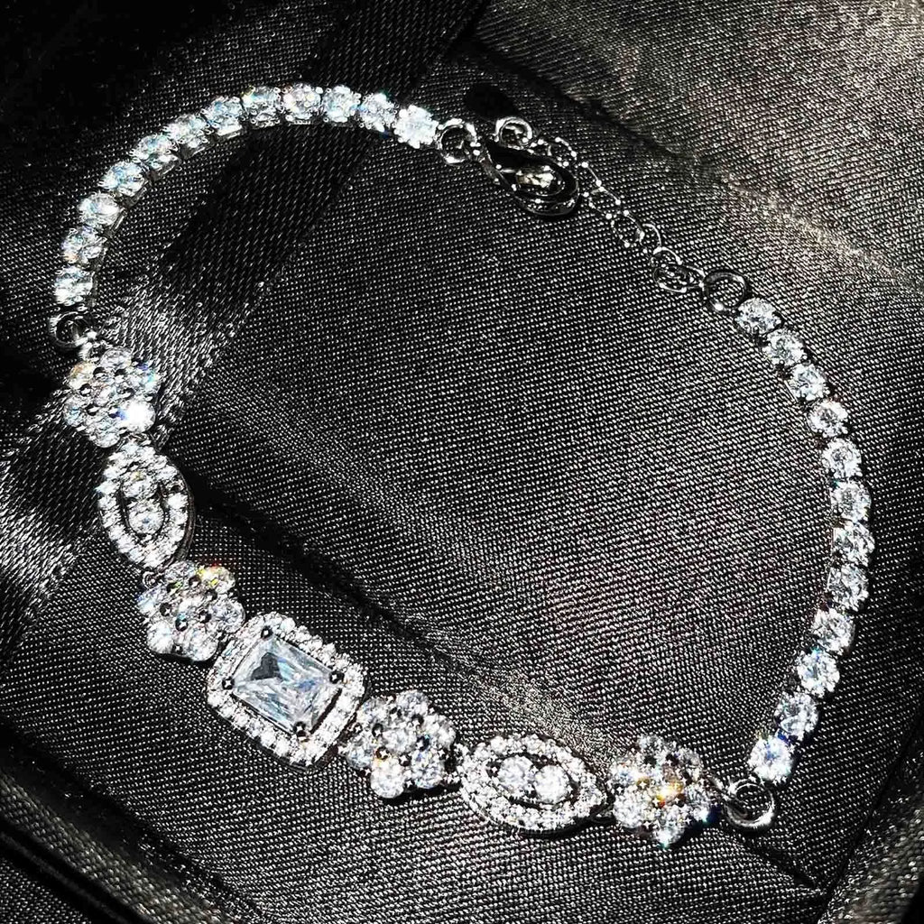 Women's geometric bracelet with silver and white gold plating featuring zircon stones