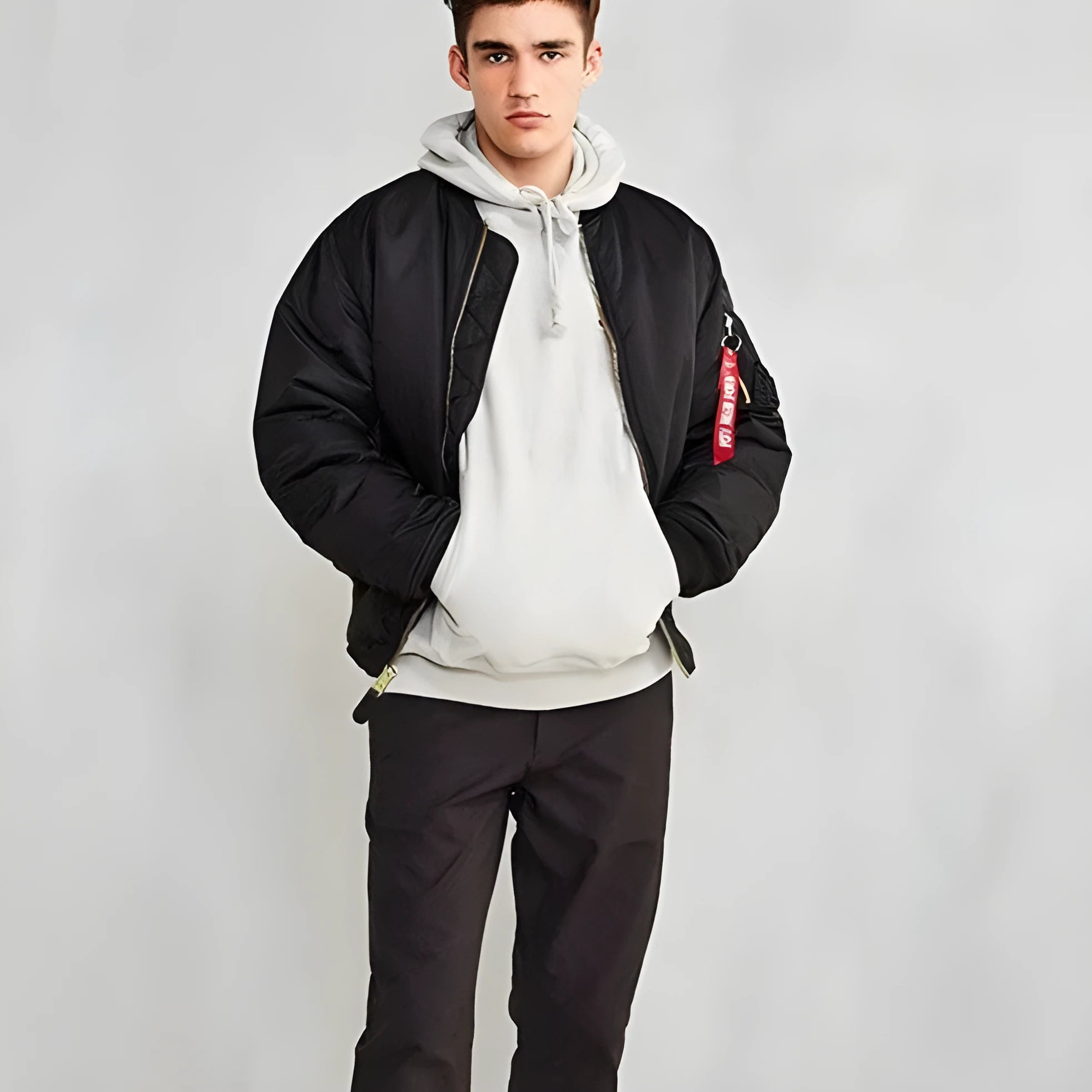 Men's loose fit nylon pilot jacket in army green, shown with cotton padding and double-sided wear-resistant construction.