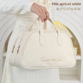 Leather travel toiletry bag in caramel mocha colour with dry wet separation compartments