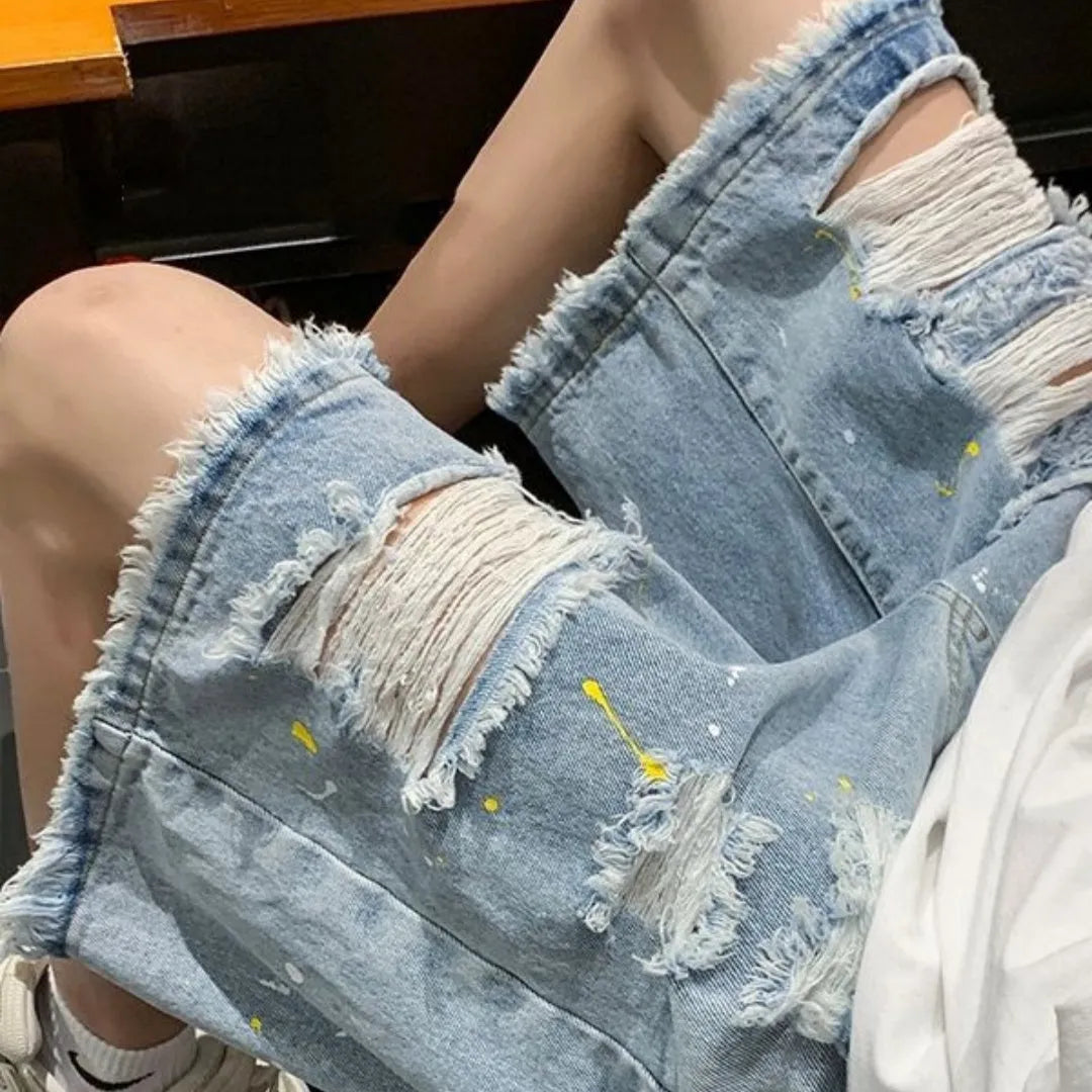 Men's water washed denim shorts with distressed holes, loose street style fit in light blue colour