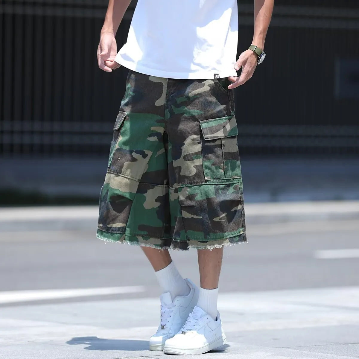 Men's camouflage pattern shorts with American retro workwear styling in loose cropped cut