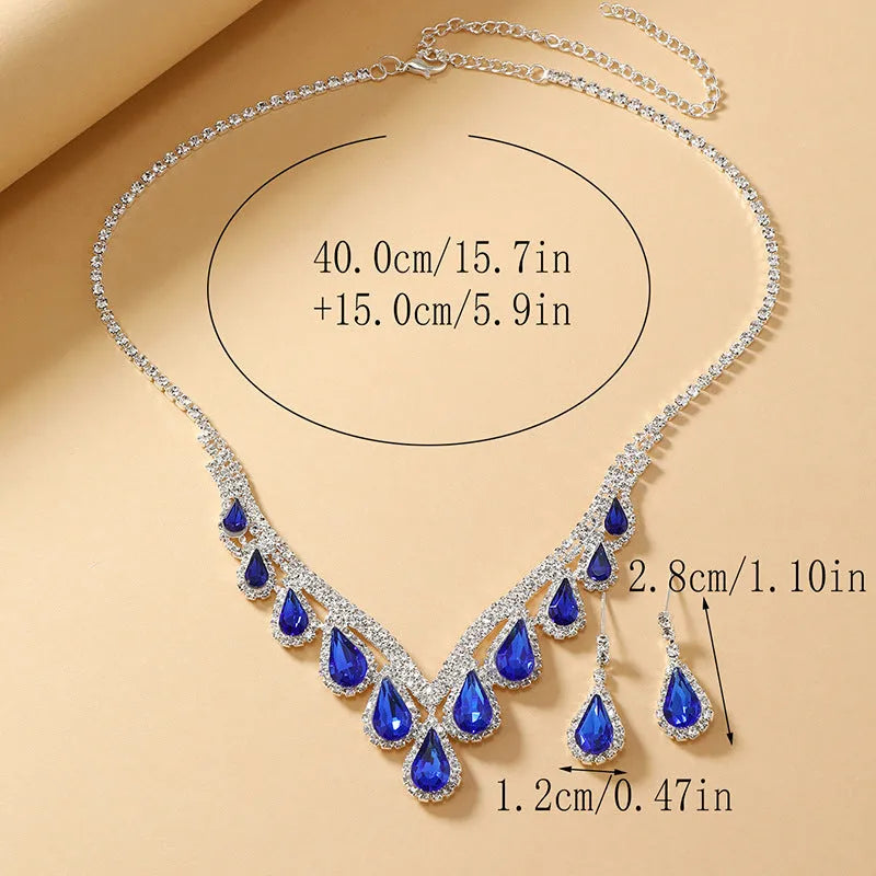 Royal Blue White K alloy jewellery set with a regular chain necklace and earrings on display