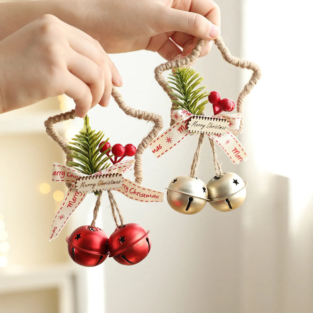 Iron Christmas bell ornament in gold on white background