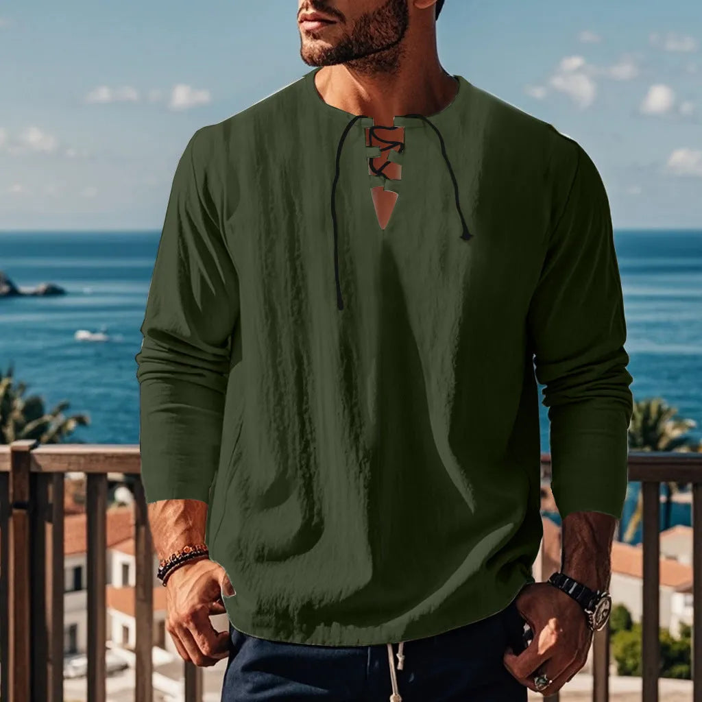 Cotton linen blend solid colour beach shirt in a loose pullover style on a hanger.