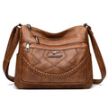 Soft PU leather women's crossbody shoulder bag in horizontal square shape with internal zipper compartments