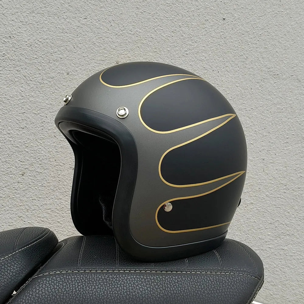 Glass fibre retro half motorcycle helmet shown in various colours including cement gray and matte black options