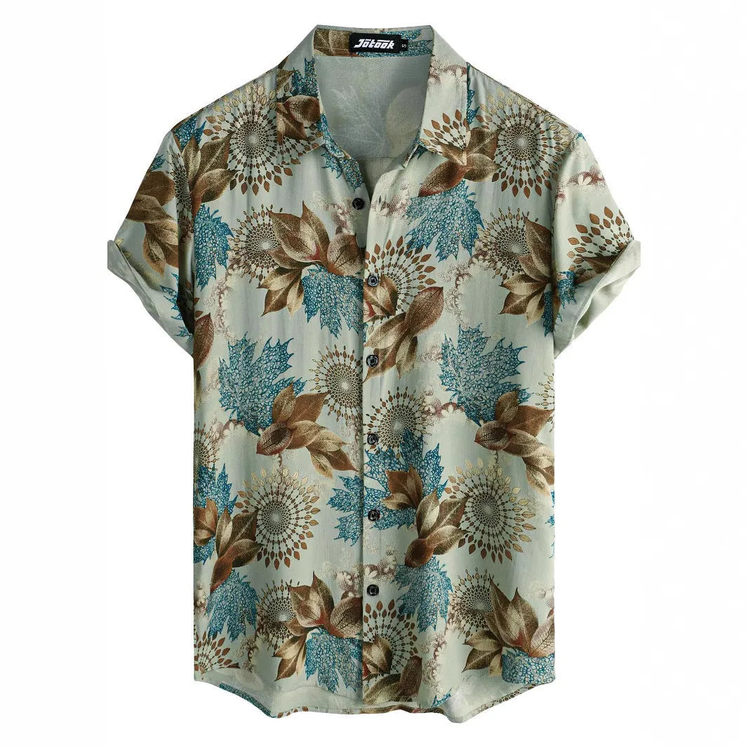 Man wearing a short sleeve Hawaiian shirt with a blue and white floral digital print and a lapel collar.