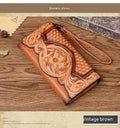 Women's brown leather tri-fold wallet with embossed Chinese floral pattern showing interior compartments