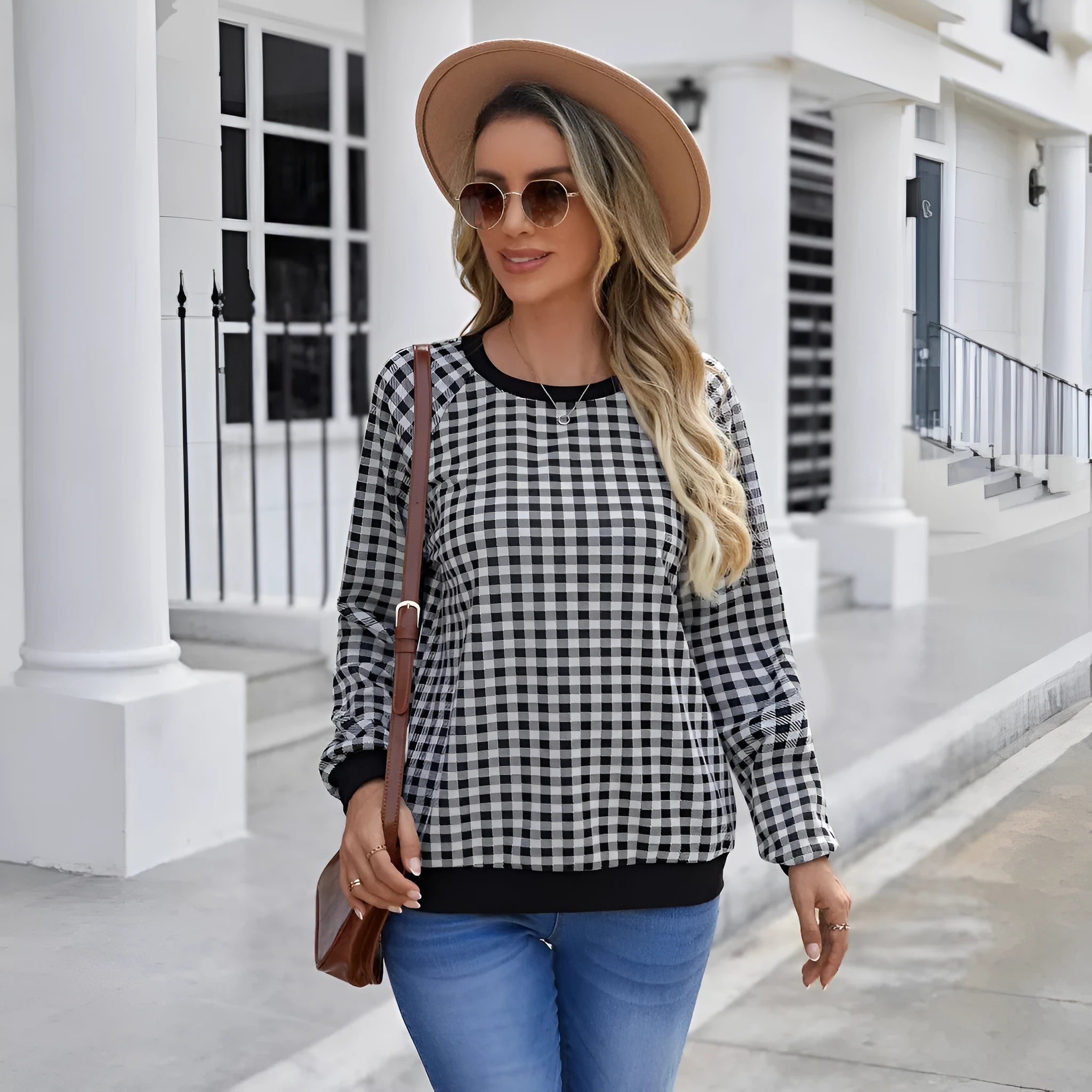 Black long sleeve pullover sweater with a printed Japanese plaid pattern