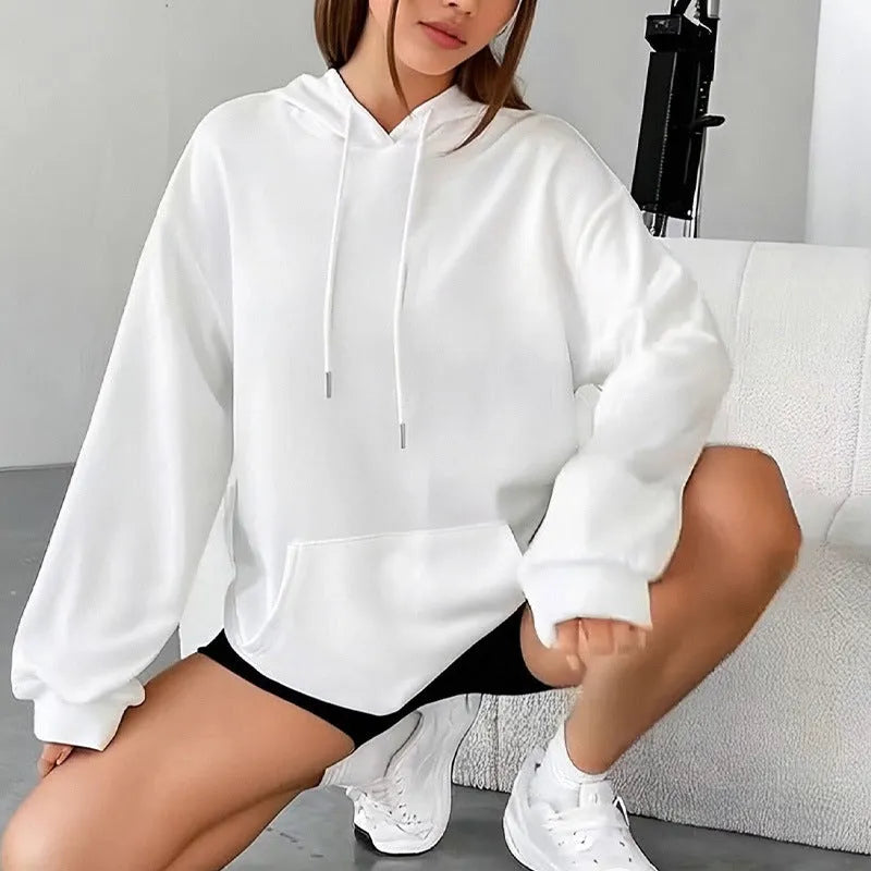 Women's loose grey drawstring pocket sweatshirt with long sleeves and a front pouch.