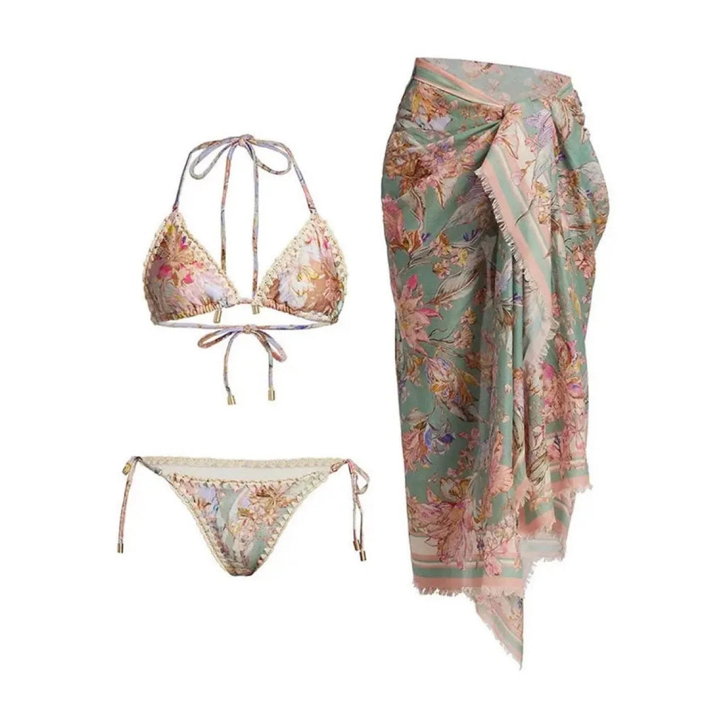 Women's creamy-white floral bikini suit with top, underwear, and matching skirt