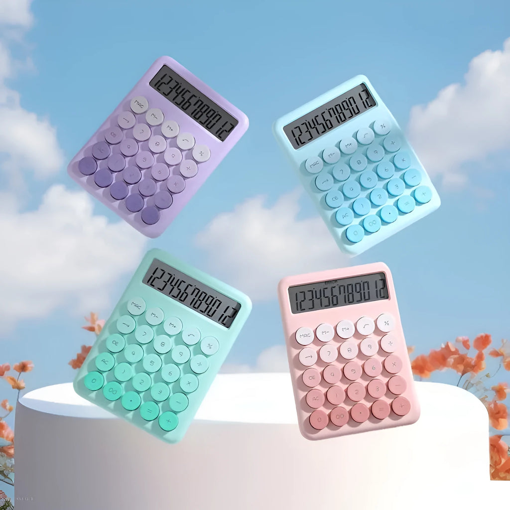 Vibrant gradient colour desktop calculator on a desk, shown in violet, pink, blue and green colour options.