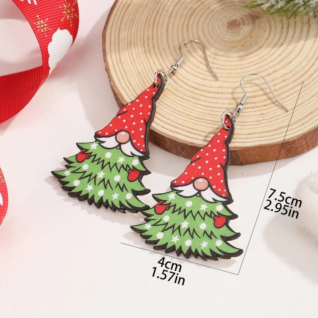 Wooden Christmas earrings with geometric shapes featuring printed Christmas tree and snowman Santa Claus designs