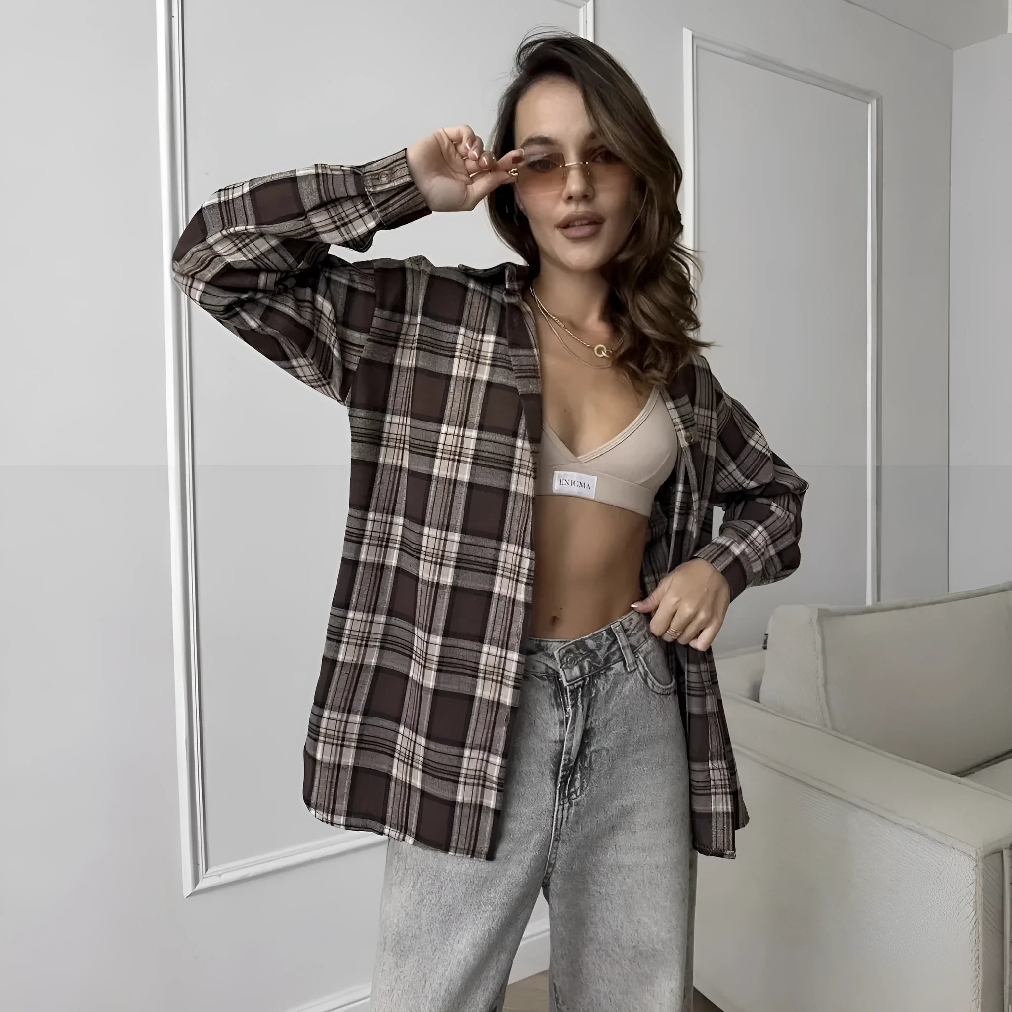 Dark brown retro striped women's long sleeve cotton shirt shown on a hanger.
