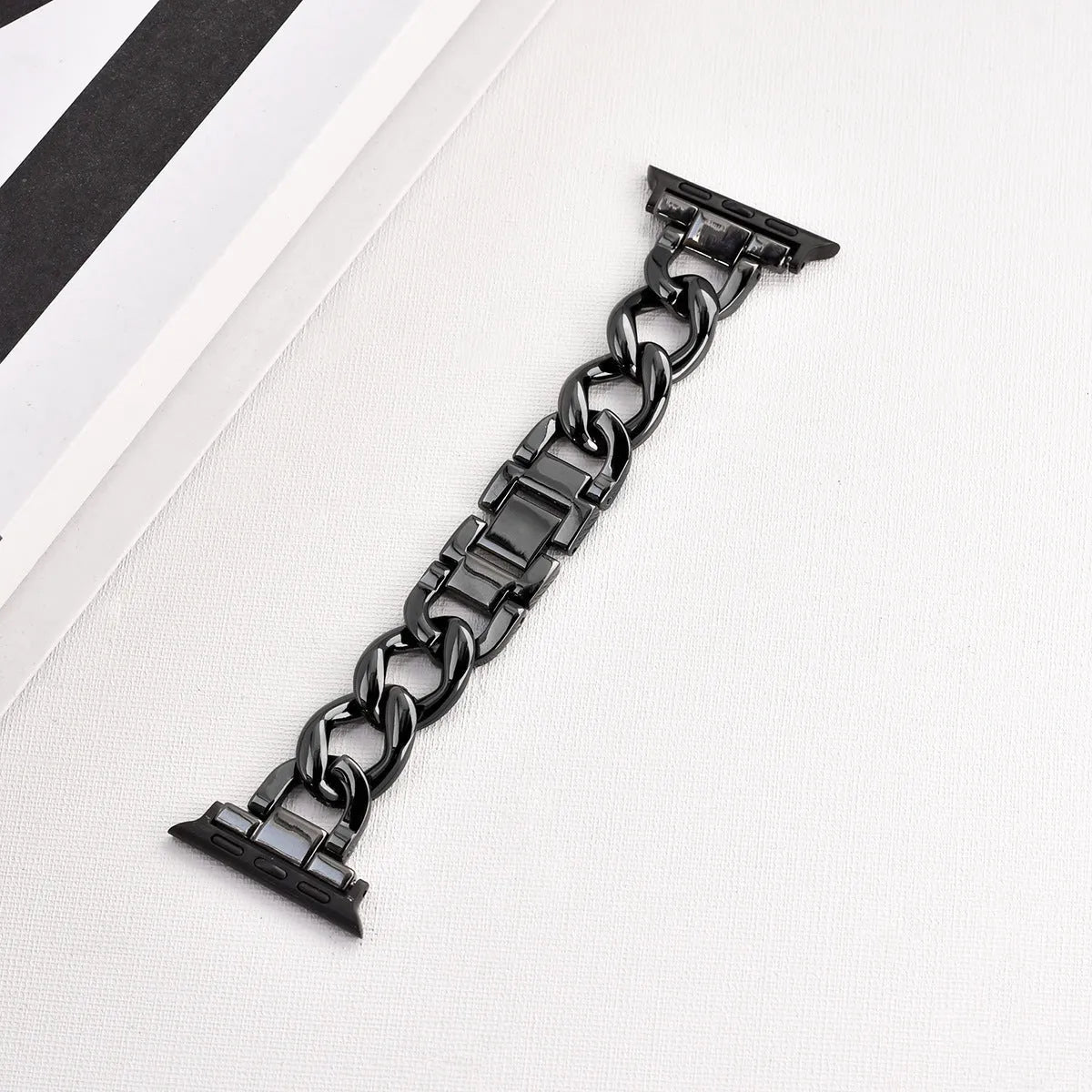 Silver denim chain link metal strap for Apple Watch with 22mm lug width on a 41mm case.