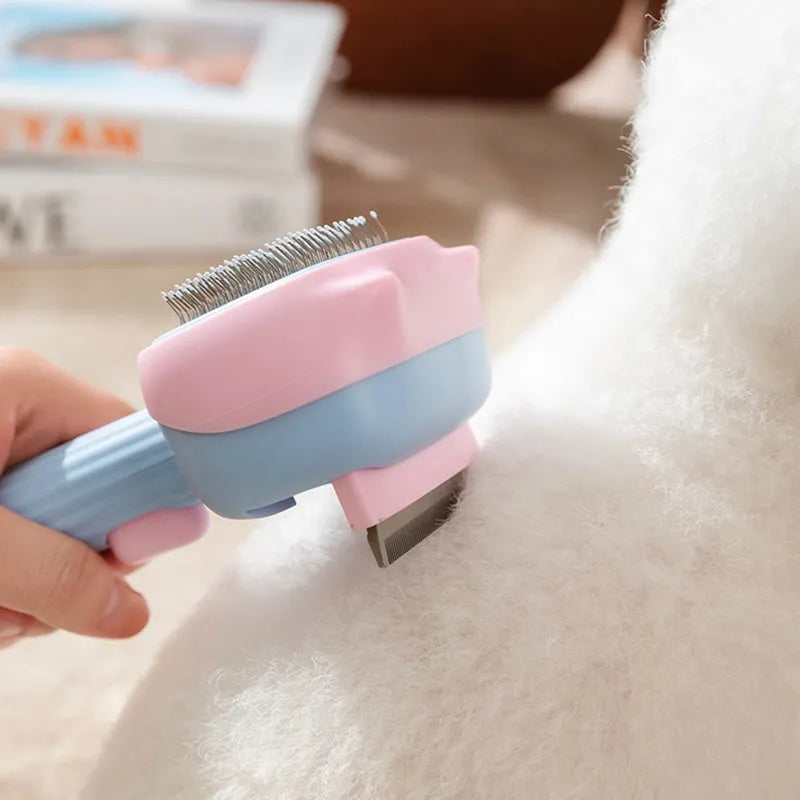 Blue and green double-sided pet grooming brush with deshedding rake and dematting comb on a white background.