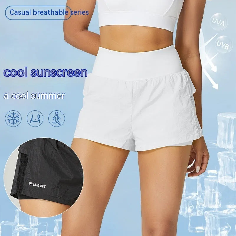 Women's loose cotton blend quick-drying sports shorts in lemon yellow on a mannequin